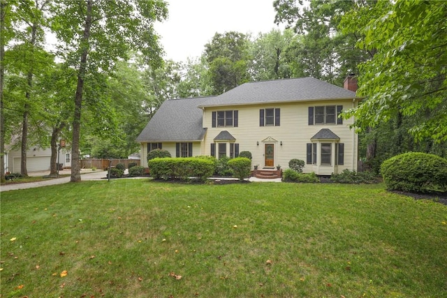 111 Halifax Rd, Easley, SC 29642 - colonial-style house featuring a chimney and a front lawn