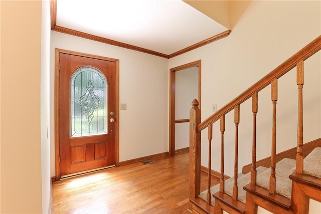 111 Halifax Rd, Easley, SC 29642 - entrance foyer with light wood-style floors, stairway, and crown molding