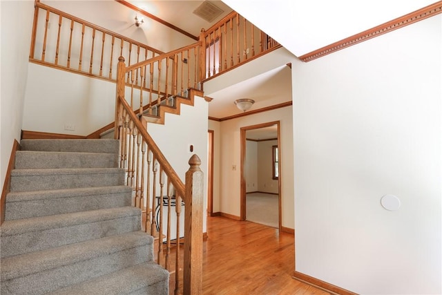 111 Halifax Rd, Easley, SC 29642 - stairs with wood finished floors and ornamental molding