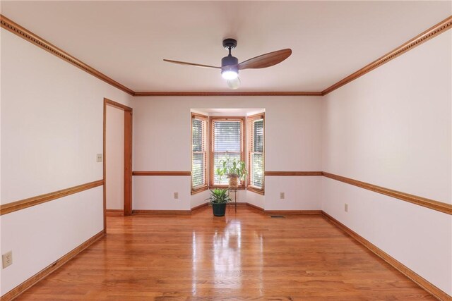 111 Halifax Rd, Easley, SC 29642 - spare room featuring a ceiling fan, light wood-style flooring, and ornamental molding