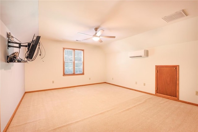 111 Halifax Rd, Easley, SC 29642 - empty room featuring a wall mounted air conditioner, carpet floors, ceiling fan, and lofted ceiling
