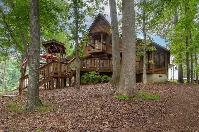 227 E Clearwater Shores Rd, Fair Play, SC 29643 - rear view of house with crawl space and a wooden deck