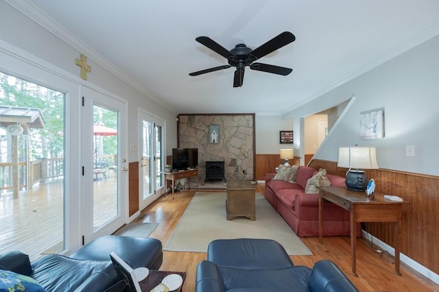 227 E Clearwater Shores Rd, Fair Play, SC 29643 - living area with ornamental molding, wooden walls, a wainscoted wall, wood finished floors, and a ceiling fan