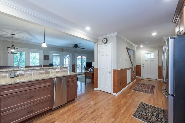 227 E Clearwater Shores Rd, Fair Play, SC 29643 - kitchen with freestanding refrigerator, refrigerator, french doors, light wood-style floors, and plenty of natural light
