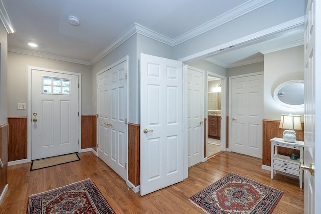 227 E Clearwater Shores Rd, Fair Play, SC 29643 - foyer featuring wainscoting, light wood finished floors, and crown molding