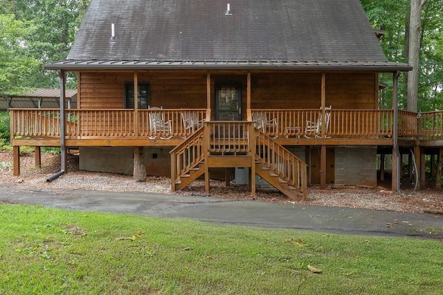 227 E Clearwater Shores Rd, Fair Play, SC 29643 - view of front of property with stairway, a metal roof, a standing seam roof, covered porch, and a front yard