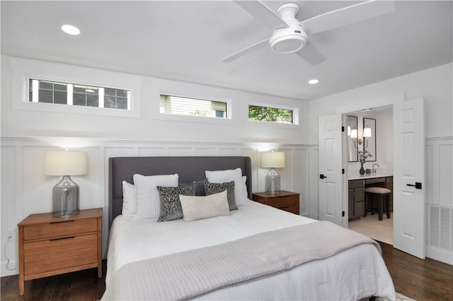36 Mizzen Ln, Salem, SC 29676 - bedroom with a decorative wall, wood finished floors, wainscoting, connected bathroom, and ceiling fan