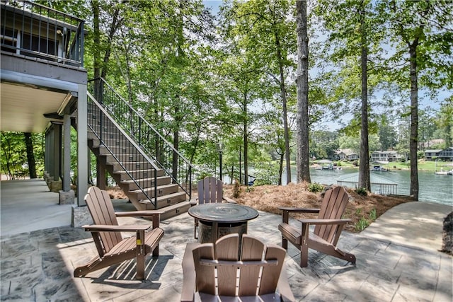 36 Mizzen Ln, Salem, SC 29676 - view of patio featuring an outdoor fire pit, stairs, a water view, and view of wooded area