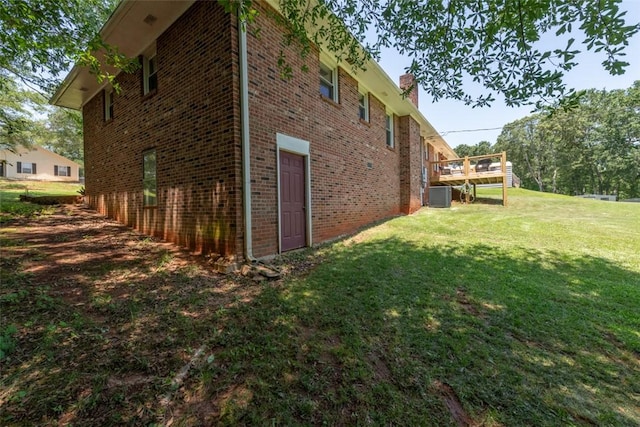 208 Springview Dr, Anderson, SC 29625 - view of home's exterior with brick siding, a yard, and a chimney