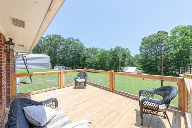 208 Springview Dr, Anderson, SC 29625 - wooden terrace featuring a lawn and a storage unit