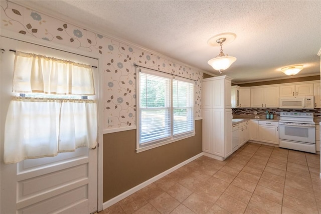 208 Springview Dr, Anderson, SC 29625 - kitchen featuring white appliances, ornamental molding, a textured ceiling, white cabinetry, and light tile patterned floors