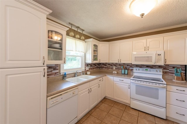 208 Springview Dr, Anderson, SC 29625 - kitchen with white appliances, a textured ceiling, decorative backsplash, light tile patterned floors, and glass insert cabinets
