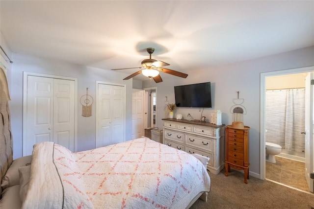 208 Springview Dr, Anderson, SC 29625 - bedroom featuring multiple closets, light colored carpet, ensuite bathroom, and ceiling fan