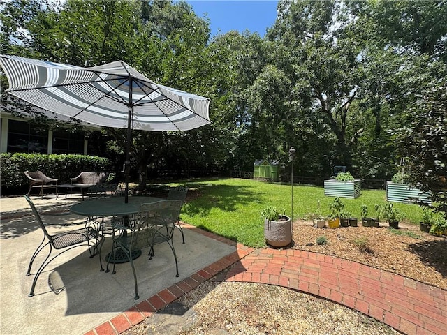 203 Catawbah Rd, Clemson, SC 29631 - view of patio featuring outdoor dining space and a garden