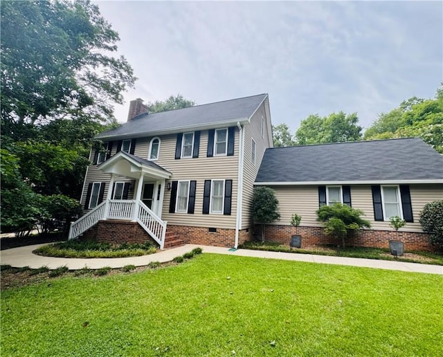 203 Catawbah Rd, Clemson, SC 29631 - colonial home with crawl space, a chimney, and a front lawn
