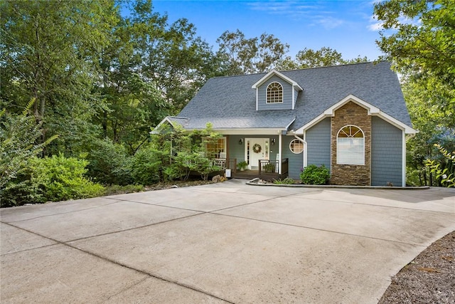 223 Inlet Pointe Dr, Anderson, SC 29625 - view of front of property with a porch, a shingled roof, stone siding, and concrete driveway