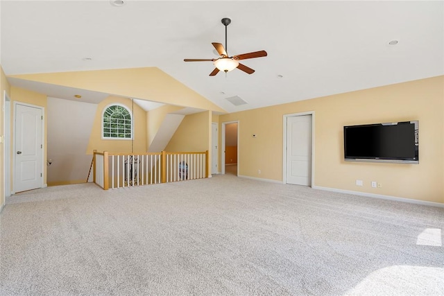 223 Inlet Pointe Dr, Anderson, SC 29625 - unfurnished living room with a ceiling fan, vaulted ceiling, and carpet flooring