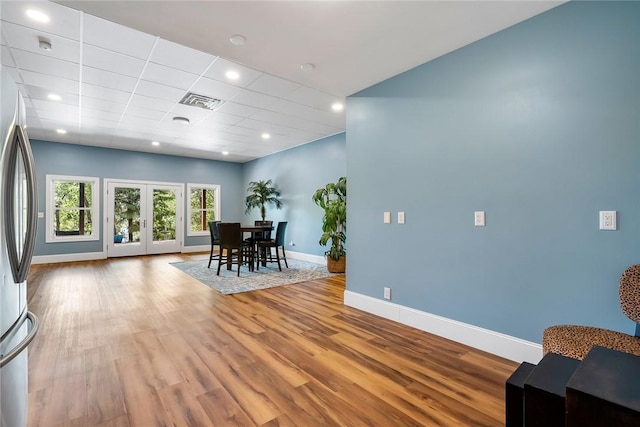 223 Inlet Pointe Dr, Anderson, SC 29625 - dining room with wood finished floors, french doors, and recessed lighting