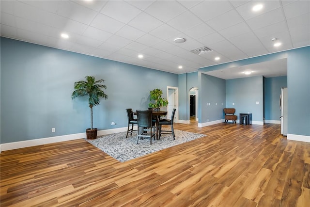 223 Inlet Pointe Dr, Anderson, SC 29625 - dining room with arched walkways, wood finished floors, and recessed lighting