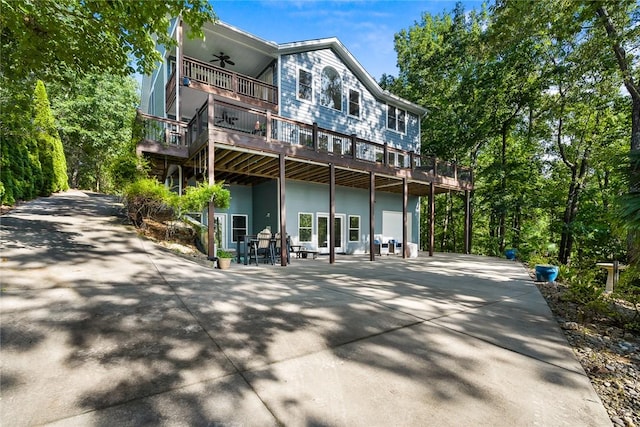 223 Inlet Pointe Dr, Anderson, SC 29625 - back of house featuring ceiling fan, a deck, and driveway