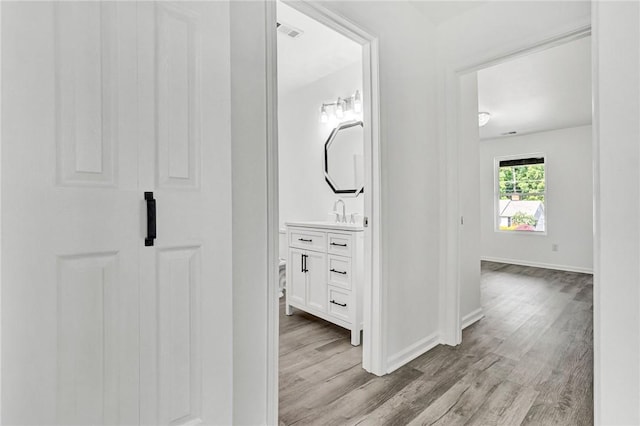 1938 Inman Dr, Anderson, SC 29625 - hallway featuring wood finished floors and baseboards