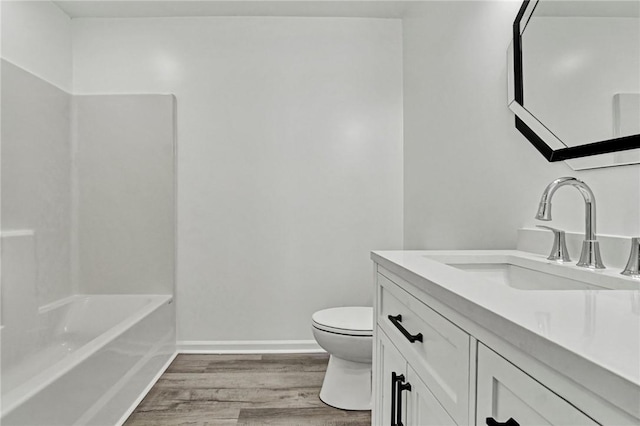 1938 Inman Dr, Anderson, SC 29625 - full bathroom featuring wood finished floors, vanity, and  shower combination