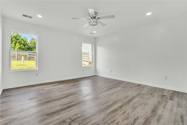 1938 Inman Dr, Anderson, SC 29625 - empty room featuring wood finished floors, plenty of natural light, a ceiling fan, and recessed lighting