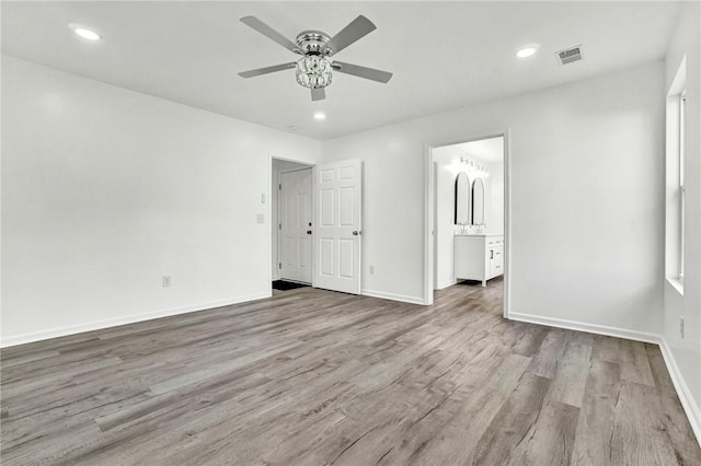 1938 Inman Dr, Anderson, SC 29625 - unfurnished bedroom with wood finished floors, recessed lighting, ensuite bath, and ceiling fan