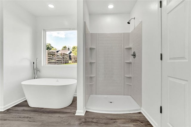 1938 Inman Dr, Anderson, SC 29625 - bathroom with a freestanding tub, wood finished floors, a shower, and recessed lighting