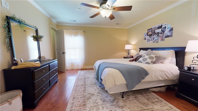 209 Calhoun St Unit 402, Clemson, SC 29631 - bedroom with wood finished floors, crown molding, and a ceiling fan