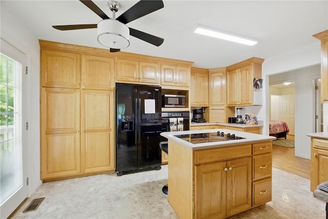 101 Jocassee Falls Rd, Salem, SC 29676 - kitchen featuring black appliances, a ceiling fan, light countertops, a center island, and light brown cabinets