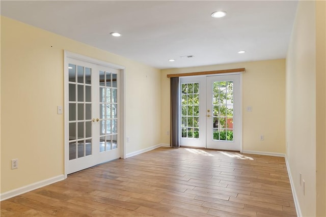 537 Sullivans Way, Seneca, SC 29678 - unfurnished room featuring french doors, wood finished floors, and recessed lighting