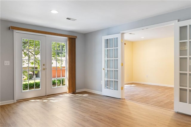 537 Sullivans Way, Seneca, SC 29678 - unfurnished room with french doors, wood finished floors, and recessed lighting