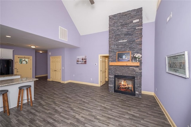 128 Willys Creek Cir, Pickens, SC 29671 - living area featuring high vaulted ceiling, a stone fireplace, dark wood finished floors, and ceiling fan