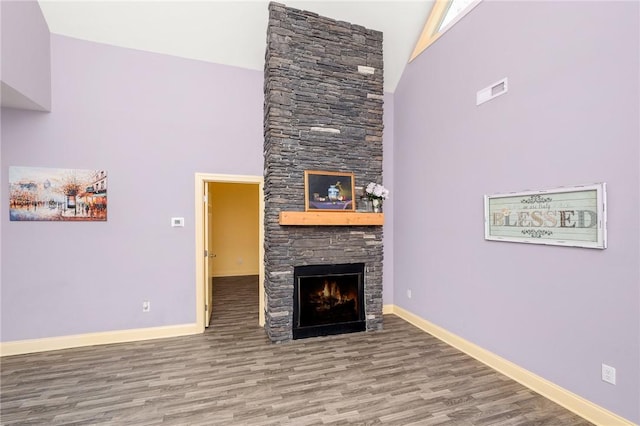 128 Willys Creek Cir, Pickens, SC 29671 - unfurnished living room featuring high vaulted ceiling, a fireplace, and wood finished floors