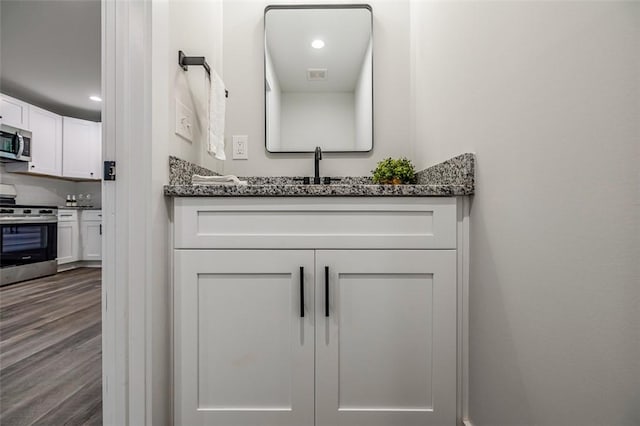 121 Brookmeade Dr Unit A & B, Anderson, SC 29624 - bathroom with wood finished floors, vanity, and recessed lighting