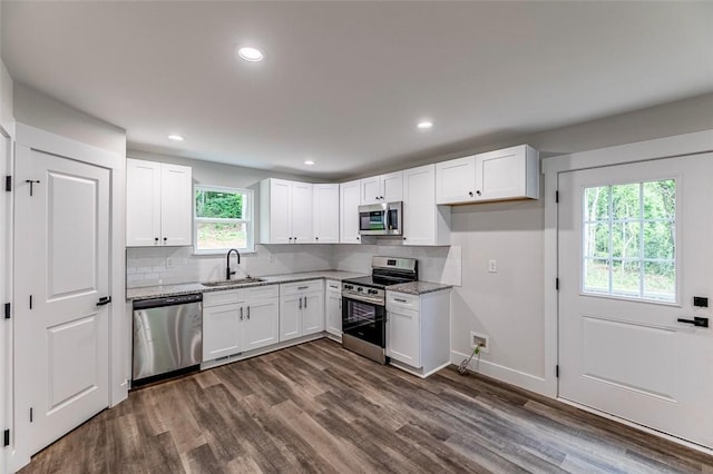 121 Brookmeade Dr Unit A & B, Anderson, SC 29624 - kitchen with stainless steel appliances, light stone counters, white cabinets, dark wood-type flooring, and recessed lighting