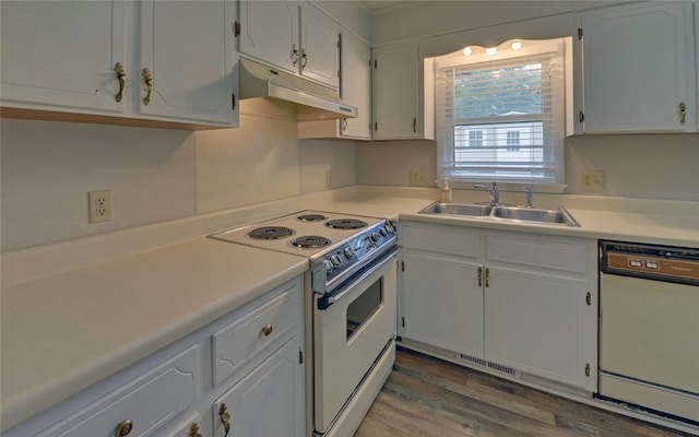 37 Cunningham Dr, Hartwell, GA 30643 - kitchen with white appliances, under cabinet range hood, light countertops, white cabinets, and wood finished floors