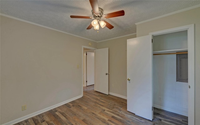 37 Cunningham Dr, Hartwell, GA 30643 - unfurnished bedroom with wood finished floors, a textured ceiling, electric panel, a closet, and ceiling fan