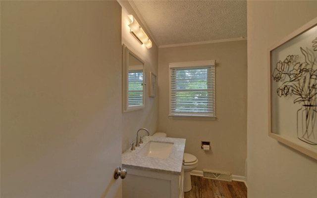 37 Cunningham Dr, Hartwell, GA 30643 - bathroom featuring vanity, crown molding, a textured ceiling, and wood finished floors