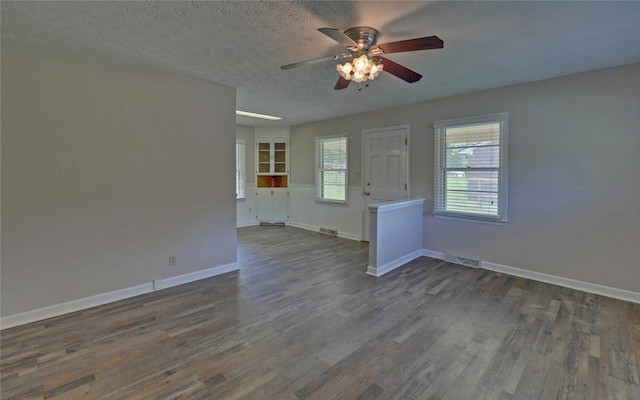 37 Cunningham Dr, Hartwell, GA 30643 - unfurnished living room with a ceiling fan, dark wood-type flooring, and a textured ceiling