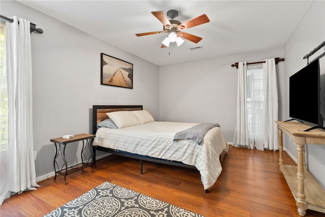 318 Weeping Willow Dr, Seneca, SC 29672 - bedroom featuring wood finished floors and ceiling fan