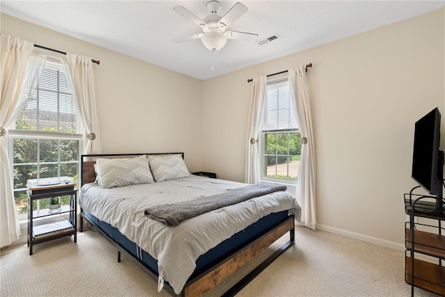 318 Weeping Willow Dr, Seneca, SC 29672 - bedroom with light colored carpet and ceiling fan