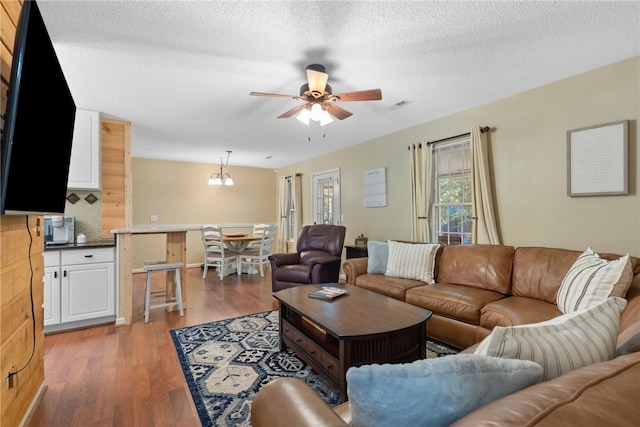 318 Weeping Willow Dr, Seneca, SC 29672 - living room with ceiling fan, light wood-style floors, and a textured ceiling