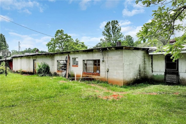 2339 Toccoa Hwy, Westminster, SC 29693 - rear view of house featuring a lawn and concrete block siding