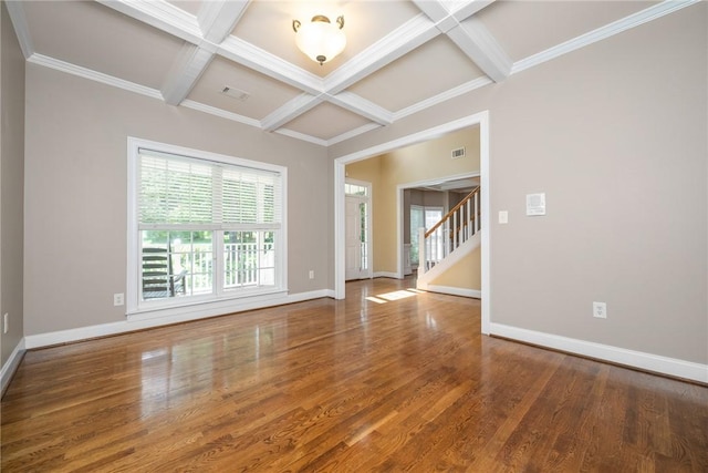 124 Bluestone Ct, Easley, SC 29642 - spare room featuring coffered ceiling, wood finished floors, beamed ceiling, stairway, and crown molding