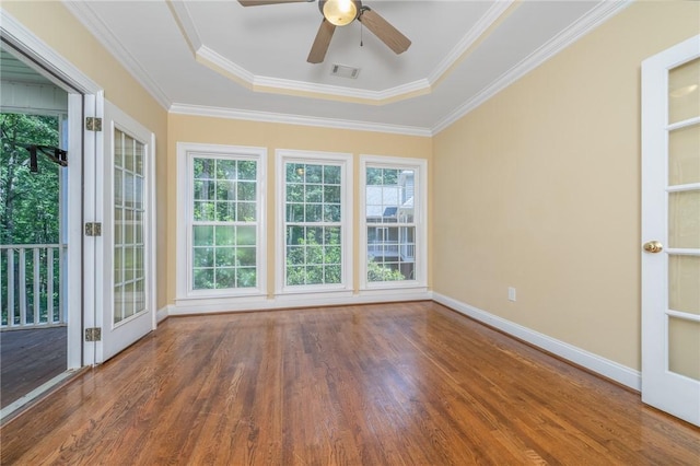124 Bluestone Ct, Easley, SC 29642 - unfurnished sunroom with a raised ceiling, wood finished floors, ornamental molding, and french doors