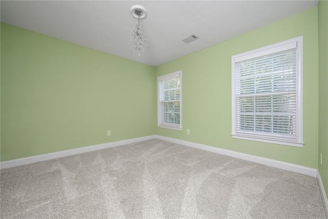 124 Bluestone Ct, Easley, SC 29642 - carpeted empty room featuring healthy amount of natural light