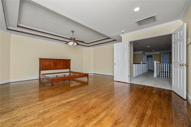 124 Bluestone Ct, Easley, SC 29642 - spare room featuring crown molding, wood finished floors, a raised ceiling, ceiling fan, and recessed lighting