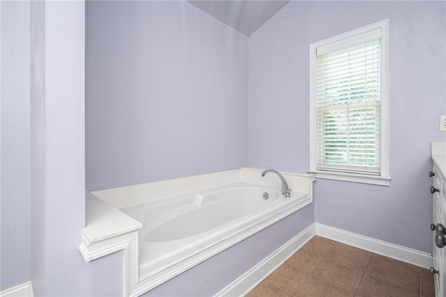 124 Bluestone Ct, Easley, SC 29642 - bathroom with a garden tub, vanity, and tile patterned flooring